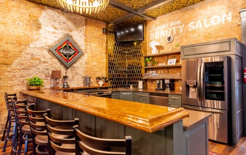 The speakeasy lounge has EVERYTHING you need for an epic experience with your friends. 3 TVs, seating for up to 22 people and a full gourmet kitchen!