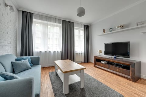 Superior Apartment | Living area | Flat-screen TV