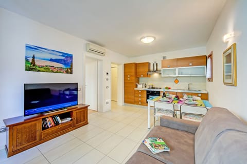 Family Apartment, 1 Bedroom (Sun And Wind - Holiday Apartment) | Living area | Flat-screen TV