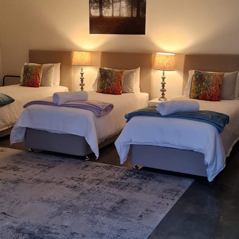 Deluxe Suite, Multiple Beds, Courtyard View, Garden Area | Egyptian cotton sheets, premium bedding, down comforters, pillowtop beds