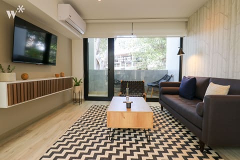 Basic Single Room | Living area | Smart TV