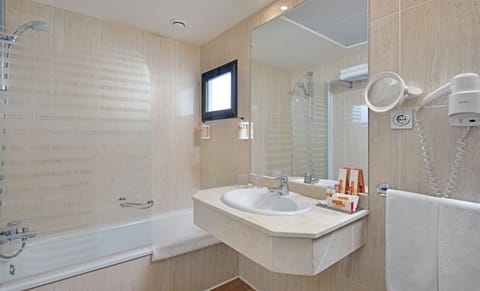 Eco-friendly toiletries, hair dryer, towels, soap