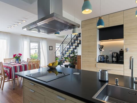 Furniture, Cabinetry, Property, Countertop, Table, Kitchen, Interior Design, Lighting, Kitchen Sink, Architecture