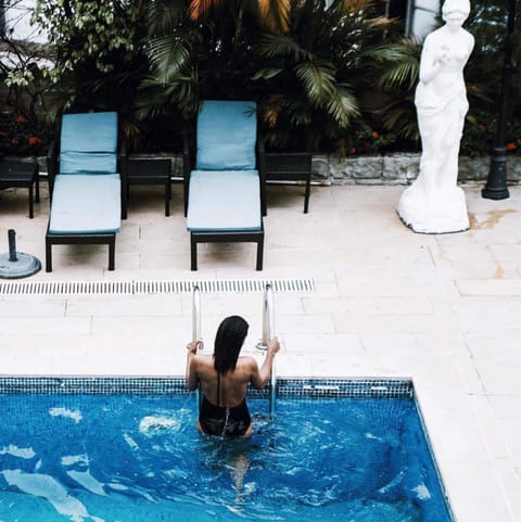 Outdoor pool, sun loungers