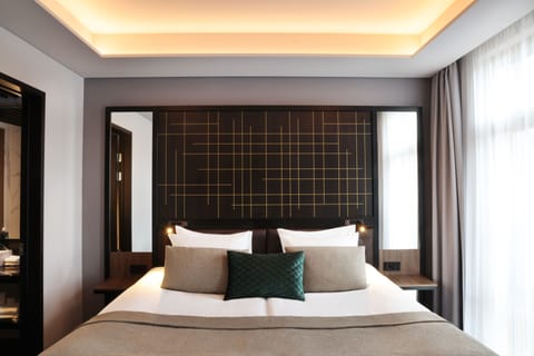 Standard Double Room | Premium bedding, minibar, in-room safe, individually decorated