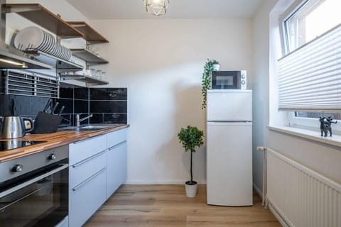 The kitchen is fully equipped