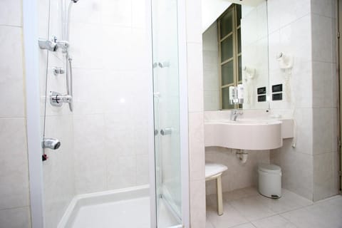 Shower, free toiletries, hair dryer, towels