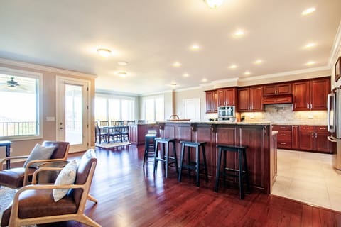 Elegant kitchen with a spacious bar, perfect for group gatherings