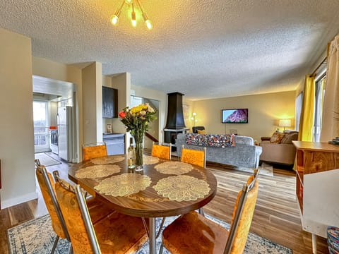 Six person dining table, with a selection of games available to play!