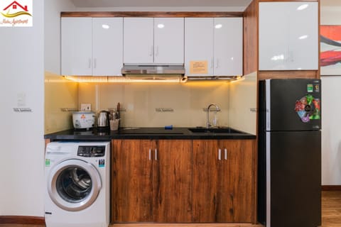 Apartment, 2 Bedrooms | Private kitchen | Fridge, stovetop, rice cooker, cookware/dishes/utensils