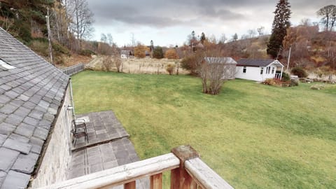 Looking out from the upstairs balcony towards summer house.