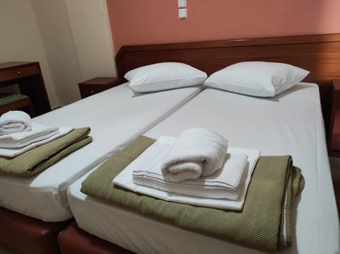 Economy Triple Room | Egyptian cotton sheets, premium bedding, free cribs/infant beds