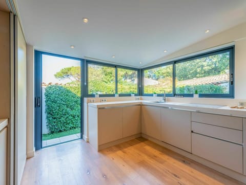 Cabinetry, Property, Building, Countertop, Sink, Kitchen Sink, Tap, Window, Azure