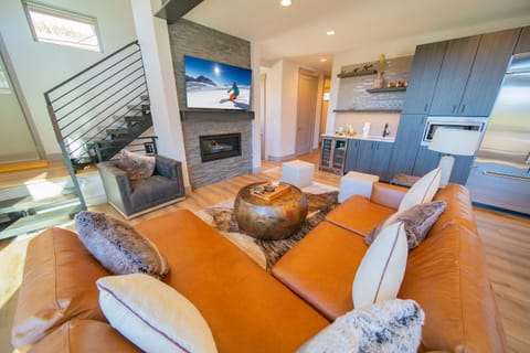 Enjoy the gas fireplace and large TV