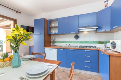 Family Apartment, 2 Bedrooms, 2 Bathrooms (Le Dimore di Nettuno 1 With Pool) | Private kitchen | Fridge, microwave, stovetop, dishwasher