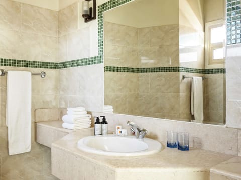 Shower, eco-friendly toiletries, hair dryer, towels