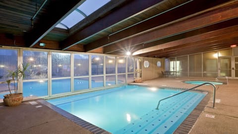 Indoor pool, outdoor pool, open 9:00 AM to 10:00 PM, sun loungers