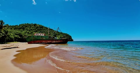 Beach nearby, black sand, 2 beach bars