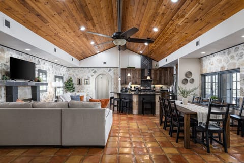 Up to 16 place settings between kitchen island, table, and window bar table