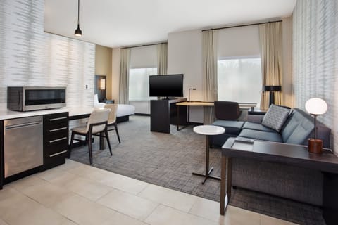 Desk, laptop workspace, blackout drapes, iron/ironing board