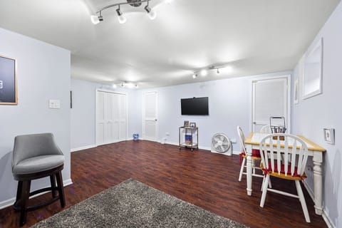 Basement with sofa bed, working area