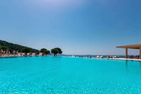 Indoor pool, pool umbrellas, sun loungers