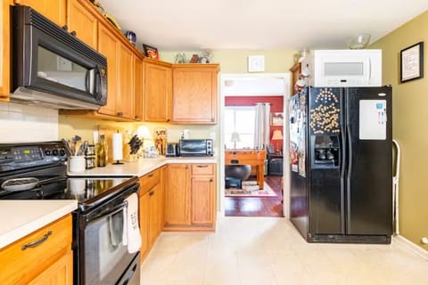 Two microwaves. A second frig can be found in the basement.