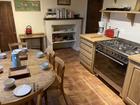 old fireplace in the rear converted into a cupboard