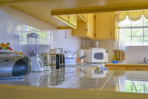 Economy Apartment, 2 Bedrooms | Private kitchen | Full-size fridge, microwave, oven, stovetop