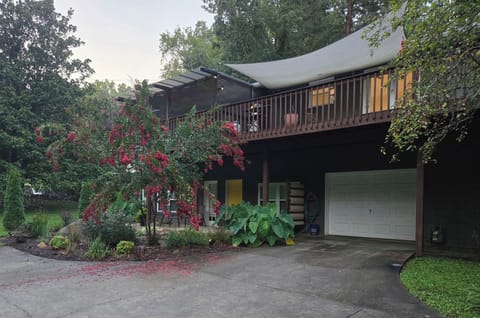Entrance to apartment within intimate garden setting.