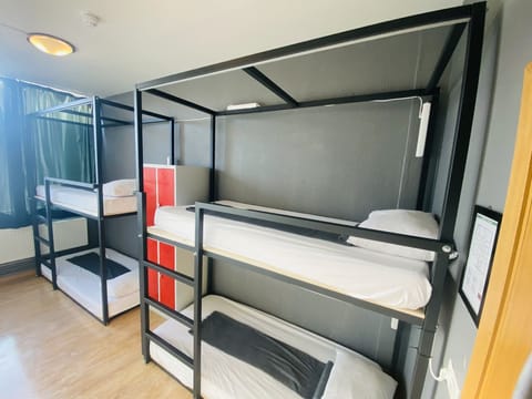 Shared Dormitory, Shared Bathroom (1 bed in 4 beds dorm) | Free WiFi, bed sheets