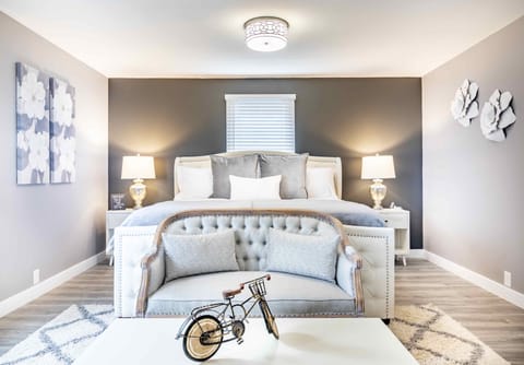 Spacious Master bed room with king size bed, 65" TV and en-suite bathroom.