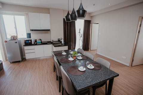 Family Suite | Private kitchen | Espresso maker, electric kettle, dining tables