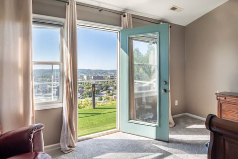 Master bedroom offers a walk out private deck with great views of the city skyline.