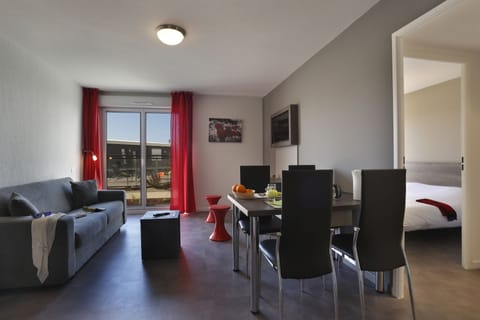 Apartment, 1 Bedroom, Balcony | Living area | Flat-screen TV