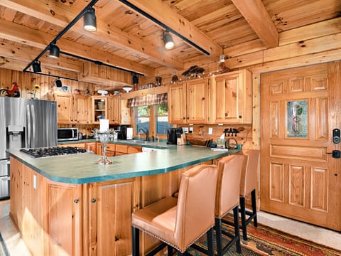 Enjoy cooking in this kitchen with a new gas range and refrigerator.