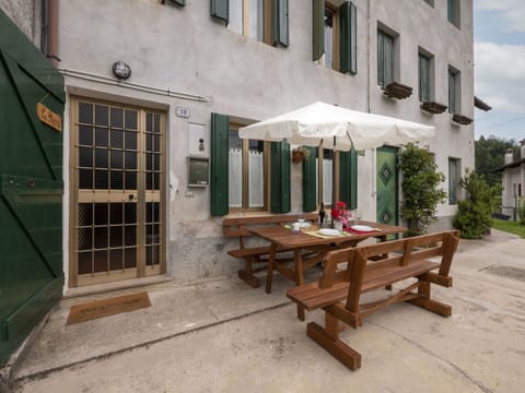 Building, Table, Property, Window, Outdoor Bench, Shade, Outdoor Table, Road Surface, Outdoor Furniture, Wood