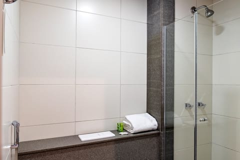 Shower, eco-friendly toiletries, hair dryer, towels