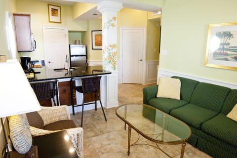 Deluxe Suite, 1 Bedroom, Non Smoking, Kitchenette | Living area | 42-inch flat-screen TV with cable channels, TV, DVD player