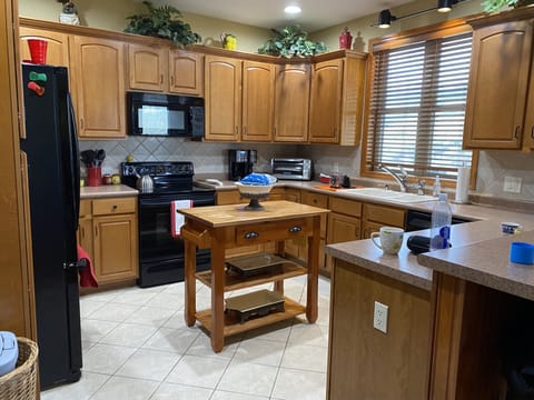 Fully stocked kitchen includes all you need to cook and comes with a great view.