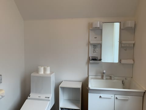 House | Bathroom | Shower, free toiletries, hair dryer, slippers