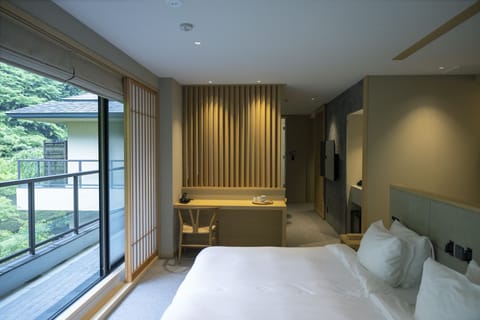 Junior Suite Garden Twin Room, Non Smoking | Free minibar, in-room safe, soundproofing, free WiFi