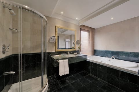 Royal Suite, 1 King Bed, Tower | Bathroom | Combined shower/tub, designer toiletries, hair dryer, bathrobes