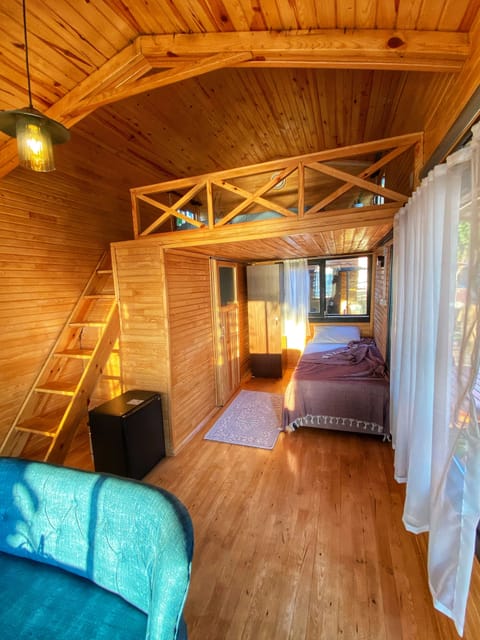 Deluxe Bungalow, Fireplace, Beachfront | Desk, laptop workspace, free WiFi, bed sheets