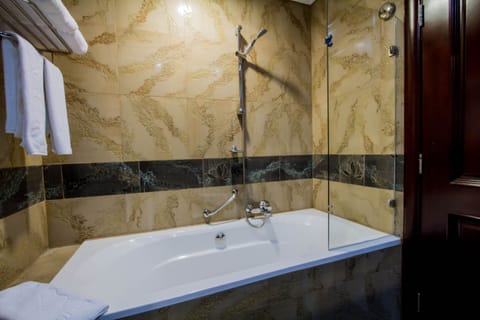 Standard Double Room | Bathroom | Bathtub, bathrobes, slippers, towels