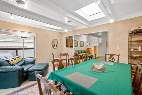 Dining room seats 8Comfy armchair for relaxing or reading a bookSmall desk for working