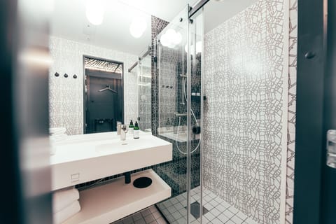 Shower, hydromassage showerhead, eco-friendly toiletries, hair dryer