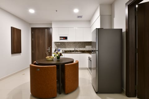 Two Bedroom Apartment | Private kitchen | Full-size fridge, microwave, coffee/tea maker, electric kettle