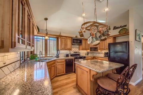 Spacious, fully stocked kitchen with full size appliances.