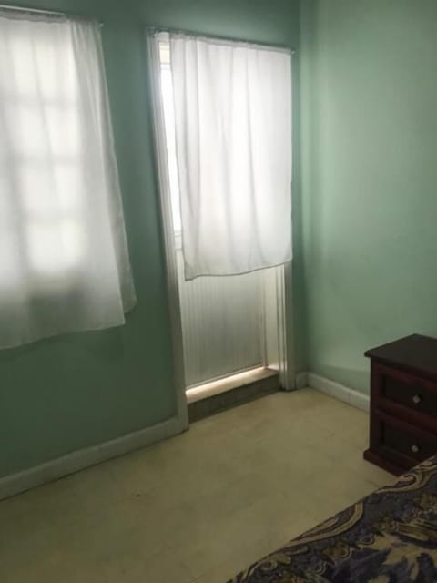 Economy Quadruple Room | Down comforters, iron/ironing board, free WiFi, bed sheets